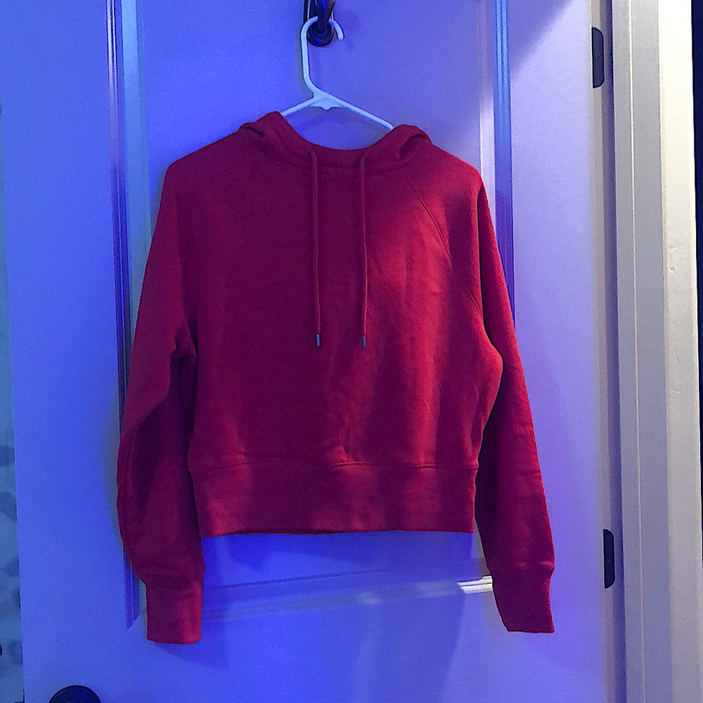 Cropped red hoodie.